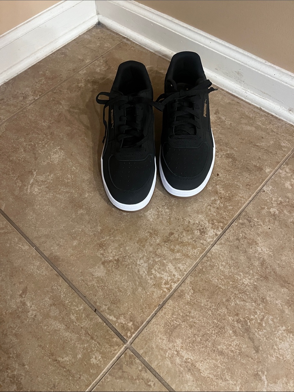 Puma Black Sneakers with White Sole size 10 men’s.